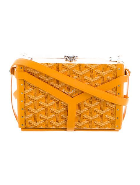 goyard mini trunk clutch.